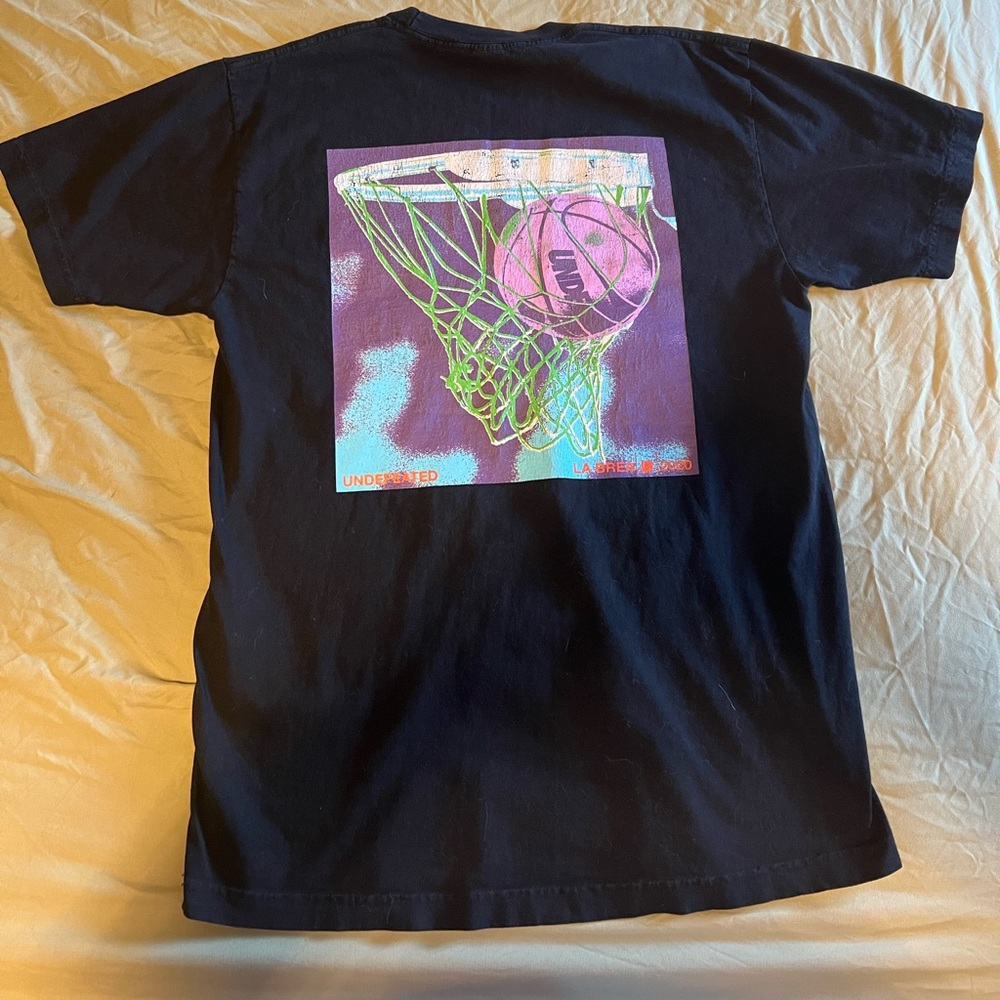 Undefeated T-Shirt Size M; Black. Undefeated T-Shirt, The Anointed One Tee.